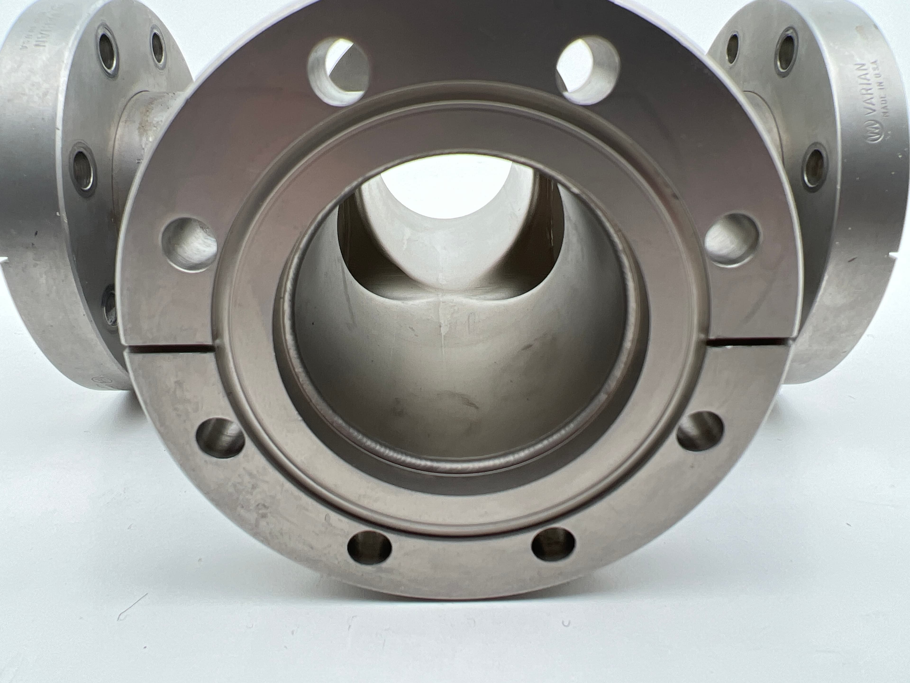 Varian DN63CF 4.50" OD UHV Vacuum 304SS, 4-Way Cross, 2.5" Tube OD.
